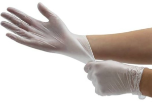 Wearing vinyl gloves